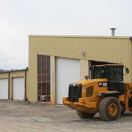 Tractor Outside of a Building